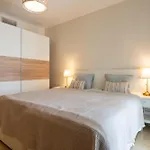 Elegant Marbella Apartment, 5-pool Oasis, Sunlit Terrace, Garage