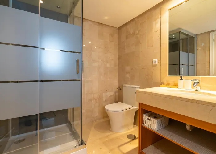 Elegant Marbella Apartment, 5-pool Oasis, Sunlit Terrace, Garage Apartment *