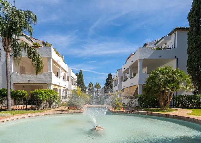 Elegant Marbella Apartment, 5-pool Oasis, Sunlit Terrace, Garage * Estepona