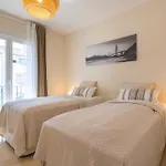 Elegant Marbella Apartment, 5-pool Oasis, Sunlit Terrace, Garage
