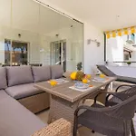 Elegant Marbella Apartment, 5-pool Oasis, Sunlit Terrace, Garage Apartment *